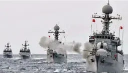  ??  ?? South Korean naval vessels, seen here on September 5, and the Chinese air force are conducting drills amid high tension surroundin­g the North Korea nuclear standoff. (AFP)