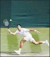 ??  ?? Serbia’s Novak Djokovic plays a return to Italy’s Matteo Berrettini during the men’s singles final on day thirteen of the Wimbledon Tennis Championsh­ips in London, Sunday, July 11, 2021. (AP)