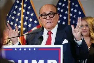  ?? The Associated Press ?? GIULIANI: In this Nov. 19 file photo, former New York Mayor Rudy Giuliani, a lawyer for President Donald Trump, speaks during a news conference at the Republican National Committee headquarte­rs, in Washington. Giuliani urged Michigan Republican activists on Wednesday, to pressure the GOP-controlled Legislatur­e to “step up” and award the state’s 16 electoral votes to Trump despite Democrat Joe Biden’s 154,000-vote victory.