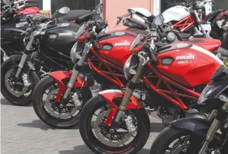  ??  ?? DUCATI MOTORBIKES are pictured in front of a shop in Berlin, April 18, 2012.