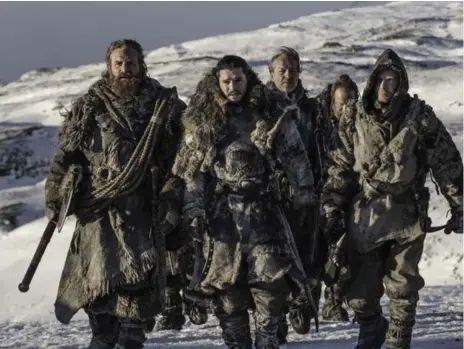  ?? HELEN SLOAN/HBO ?? Jon Snow (Kit Harington), centre, leads his men on an expedition beyond the Wall to capture a wight and bring it down south.