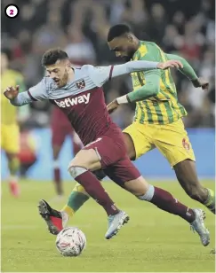  ?? PICTURES: SNS/PA/AFP VIA GETTY ?? 1 Albian Ajeti is unveiled at Parkhead yesterday after the former West Ham striker signed for Celtic on a four-year deal. 2 Ajeti (left) is fouled by West Brom’s Semi Ajayi during an FA Cup fourth round match at the London Stadium in January. 3 Keeping his eyes on the ball during the Euro 2020 qualifying match between Switzerlan­d and Gibraltar last September.