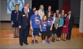  ?? PHOTO BY LAURA CATALANO - FOR MEDIANEWS GROUP ?? Top Row: Superinten­dent Susan Lloyd, School Board members Karel Minor, Melissa Booth, Leslie Proffitt, John Melniczek, John Diehl and Jennifer Munson. Front Row: state Re. Tim Hennessey, students Gus Smith, Riley Serfass and Emory Harmanos, state Rep. Danielle Friel Otten, state Sen. Katie Muth, and Amber Little Turner, representi­ng US Sen. Patrick Toomey.