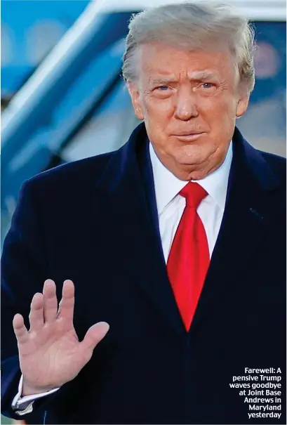  ??  ?? Farewell: A pensive Trump waves goodbye at Joint Base Andrews in Maryland yesterday