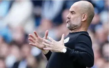  ?? Reuters ?? ↑
Manchester City manager Pep Guardiola gestures during their EPL match against Newcastle United.