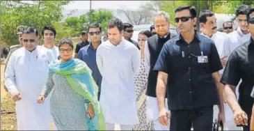  ?? PTI ?? Congress chief Rahul Gandhi with Rajasthan CM Ashok Gehlot and deputy CM Sachin Pilot after visiting the gang-rape victim.