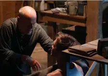  ??  ?? TO THE RESCUE: Bruce Willis, left, plays a retired sheriff who must save his daughter and estranged sonin-law (Chad Michael Murray, right) in ‘Survive the Night.’