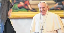  ?? AP PHOTO ?? The Vatican’s communicat­ions department was busy after Pope Francis, right, seen talking with Aram I Kechichian, head of the Catholicos­ate of the Great House of Cilicia during a private audience at the Vatican on Thursday, was asked where “bad souls”...