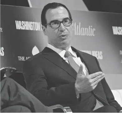  ?? ANDREW HARRER / BLOOMBERG ?? Steven Mnuchin, U.S. Treasury secretary, speaks at The Atlantic’s Washington Ideas conference in Washington, D.C. on Thursday. Mnuchin said the GOP’s plan in its tax proposal for 2.9 per cent annual growth over a decade is “doable.”