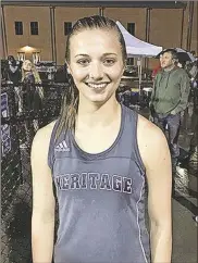  ?? / @Hhsgeneral­s ?? Heritage senior Madelyn Thompson set a new girls’ school-record with a leap of 31-feet, 2.5-inches in the triple jump during the season-opening meet at Calhoun last week.