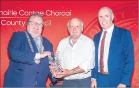  ?? (Pic: Brian Lougheed) ?? John Arnold, Bartlemy accepting the North Cork individual award from the Mayor of the County of Cork, Cllr. Danny Collins in the presence of Tim Lucey, Chief Executive, Cork County Council at the 2023 County Mayor’s Community Awards earlier this week.