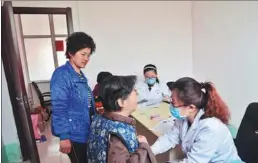  ?? ZHAO YUGUO / FOR CHINA DAILY ?? Villagers undergo checks for cervical and breast cancer at the family planning office in Liaocheng city, Shandong province.