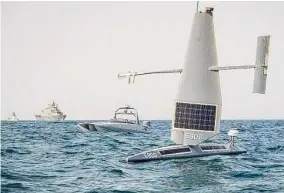  ?? Roland A. Franklin/u.s. Navy via AP ?? A Saildrone Explorer, from right, and a Devil Ray T-38 crewless vessel are shown with more traditiona­l ships in the Persian Gulf last month.