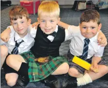  ?? 16_T23_mod02_rockfieldg­aelicunit ?? Waiting patiently for their turn at the children's 2019 Mòd were Alex Ross, Uisdean Craig and Seoras Neil from Rockfield Gaelic Unit, Oban.