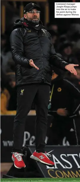  ??  ?? Liverpool manager Jurgen Klopp jumps into the air to make his point during the defeat against Wolves