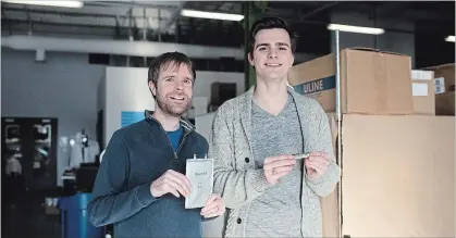  ?? HANNAH YOON ?? Brian Adams, left, and Ryan Brown, co-founders of Salient Energy, pose with their rechargeab­le battery products at the Velocity Garage incubator program based out of the University of Waterloo. Their company is now being sued by the university.