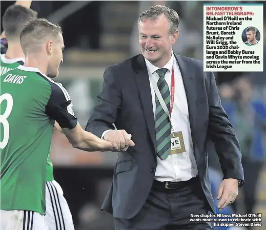  ??  ?? New chapter: NI boss Michael O’Neill wants more reason to celebrate withhis skipper Steven Davis