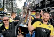  ?? ?? Dane Coles, right, with then coach Chris Boyd after the Hurricanes won the Super Rugby title in 2016.