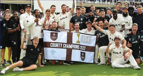  ?? GETTY IMAGES ?? Glory boys: Surrey players and staff toast their first championsh­ip triumph since 2018