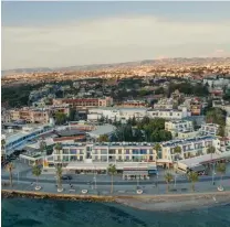  ?? ?? ABOVE: Aerial view of Paphos embankment
FAR LEFT: Studio Suite at Annabelle Hotel left: Lush tropical gardens at Annabelle Hotel