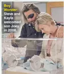  ??  ?? Boy Wonder: Steve and Kayla welcomed son Joey in 2008.