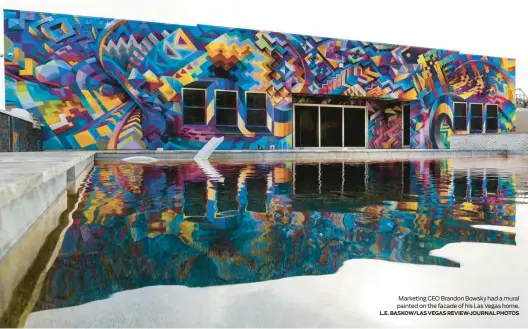  ?? L.E. BASKOW/LAS VEGAS REVIEW-JOURNAL PHOTOS ?? Marketing CEO Brandon Bowsky had a mural painted on the facade of his Las Vegas home.