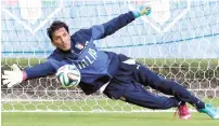  ??  ?? Gianluigi Buffon of Italy in action during a training session on June 11, 2014 in Rio de Janeiro, Brazil.