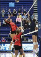  ?? TIM PHILLIS — FOR THE NEWS-HERALD ?? Maisie Burlison (25) goes up for the kill attempt for Chardon.