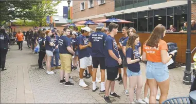  ?? Todd Tracy / Hearst Connecticu­t Media file photo ?? Students arrive on the Western Connecticu­t State University campus in Danbury on Aug. 23, 2019, the first move-in day of the fall semester.