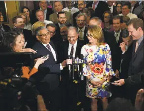  ?? Jessica Hill / Associated Press ?? State Democratic President Pro Tempore Martin M. Looney D-New Haven, laughs as Senate Republican President Pro Tempore Len Fasano, R-North Haven, left, and House Minority Leader Themis Klarides, R-Derby, right, look on, during a news conference to...