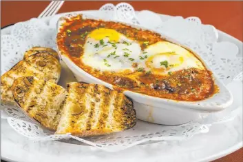  ?? Gaetano’s ?? Gaetano’s, a longtime locals favorite in Henderson, serves brunch from 10 a.m. to 2 p.m. every Sunday, with dishes that include this eggs in Purgatory with short rib.