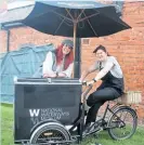  ?? ?? Attraction­s and destinatio­ns manager Ani Sutton and engagement manager Rebecca Mason on the ice cream bike.