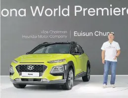  ?? AP ?? Chung Eui-sun, a vice-chairman of Hyundai Motor Co., speaks next to the new Kona SUV during its world première in Goyang, South Korea, on Tuesday.