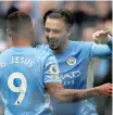  ?? LEE SMITH Reuters ?? JACK Grealish celebrates with Gabriel Jesus |