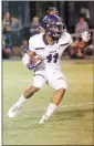  ??  ?? Senior Lonoke running back Anthony Parks carries the ball during action against Carlisle last year.