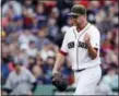  ?? CHARLES KRUPA — THE ASSOCIATED PRESS ?? Red Sox starting pitcher Brian Johnson pumps his fist after completing the top of the eighth inning on Saturday.