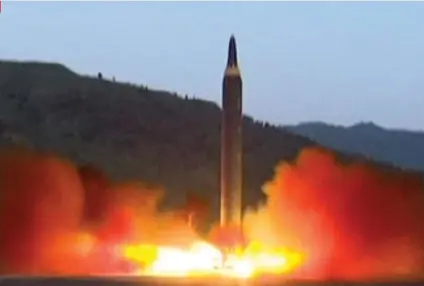  ?? AP FOTO ?? THREAT. An image taken from a video said to be the launch of the Hwasong-12 missile. North Korea has threatened to fire at a US military hub in Guam.