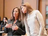  ?? Richard Harbus/Pool photo ?? Michelle Troconis, right, speaks with her attorney Audrey Felsen on the sixth day of her trial in Stamford Superior Court, in Stamford Friday.