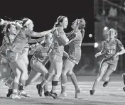  ?? MATTHEW LEWIS Matthew Lewis ?? Lourdes’ Coco Aguilar celebrates with teammates after scoring in the Bobcats’ 2-0 win over St. Thomas Aquinas.