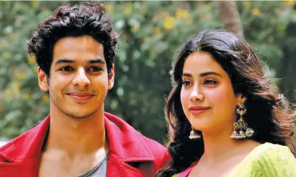  ?? Dhadak ?? Ishaan Khatter (left) and Janhvi Kapoor look on during the trailer launch of the upcoming romantic drama Hindi film in Mumbai on June 11, 2018.