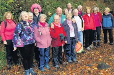  ??  ?? Hiking The Maybole ) ver Fifties Walking Group joined in the campaign to Wear it Pink for Breast Cancer and enjoyed getting into the mood