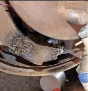  ??  ??  If there’s a mechanical adjuster 14 for the brake shoes, check this is free-moving and spray over it with a light grease. The adjuster can be removed, stripped and lubricated if necessary. Note which way it needs to be turned to adjust the brake shoes in and out.
