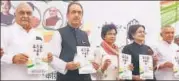  ?? SANJEEV SHARMA/HT PHOTO ?? (From left) Bhupinder Singh Hooda, Ghulam Nabi Azad, Kumari Selja, Kiran Choudhary and Pawan Kumar Bansal release Congress manifesto in Chandigarh on Friday.