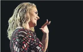  ?? FOTO: AP ?? GLAD: Adele er glad for at Spice Girls er tilbake.