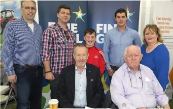  ??  ?? Sean Kelly MEP with a group of supporters on the Fine Gael stand at Charlevill­e Show.