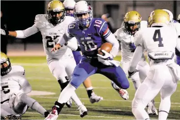  ?? David Hopper / For the Chronicle ?? Oak Ridge quarterbac­k Braden Letney, seen running through the Klein Collins defense late last year. has returned in style this season. Letney threw three touchdown passes and rushed for another against Aldine last week for the team’s first win of the season.