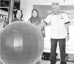  ??  ?? Hamisa (centre),flanked by the ministry's permanent secretary Datuk BrunoVun (right) and the ministry's principal assistance secretary Moira David (left), launching the job carnival at Imago Mega Mall, yesterday.