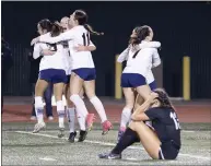  ?? ?? Roosevelt players celebrate after their come-from-behind win over Palos Verdes in the CIF-SS Division 1champions­hip game.
