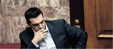  ?? ARIS MESSINIS / AFP / Gett y Images ?? Greek Prime Minister Alexis Tsipras addresses parliament in Athens on Sunday. He came to power two weeks ago, riding a wave of hope for change. But his pledge
to rewrite the country’s bailout agreement doesn’t depend on him alone.