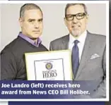  ??  ?? Joe Landro (left) receives hero award from News CEO Bill Holiber.